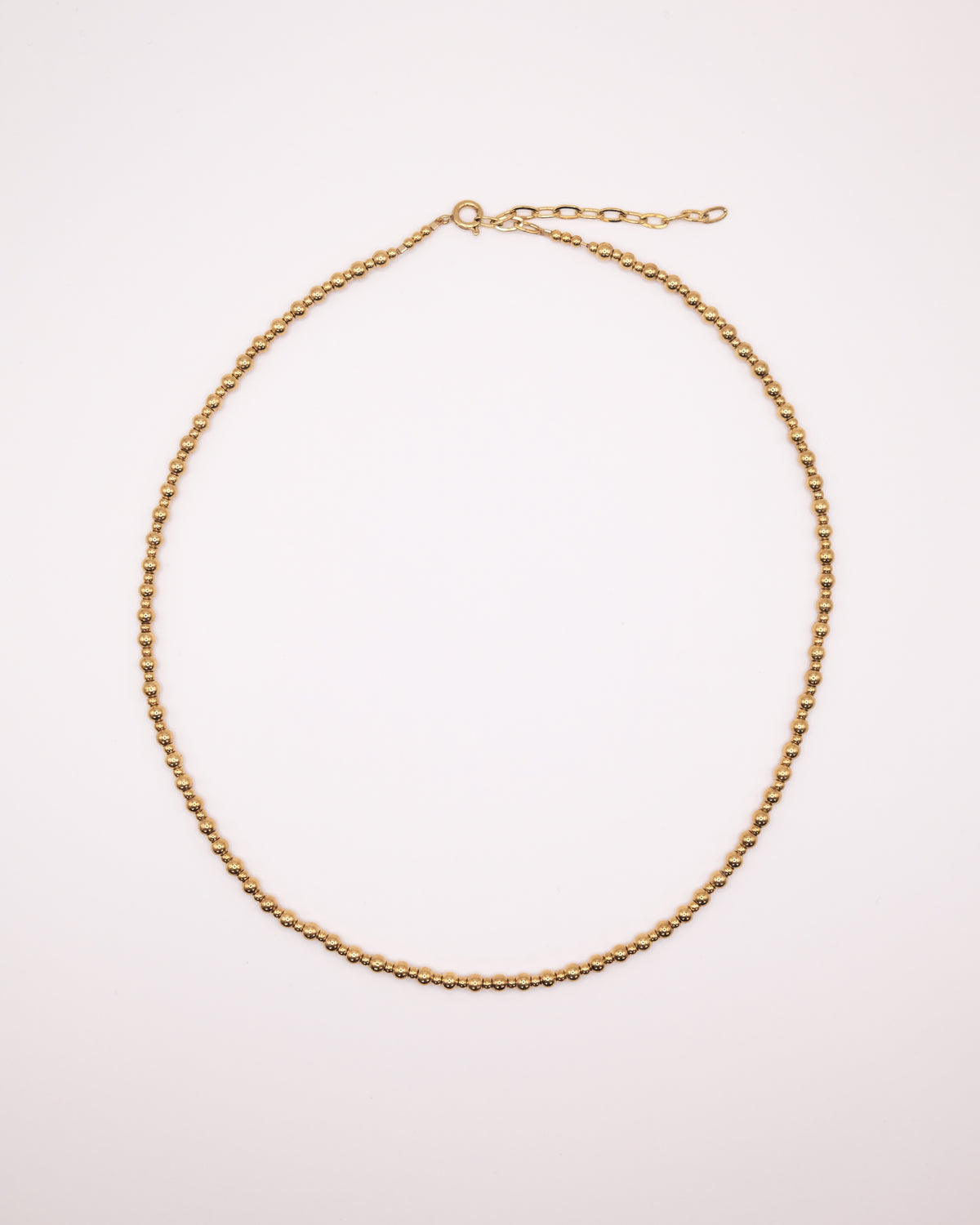 Collier Gigi ras de cou doré en perles irrégulières