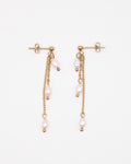 Boucles d’oreilles Marguerite dorées avec perles de culture sur chaînettes